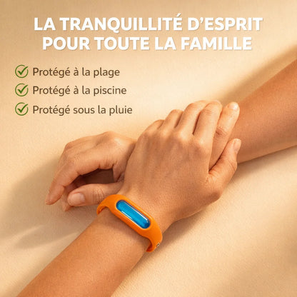 Product (bracelet anti-moustique worn on wrist, hands-only) on solid #f8f4e9 cream background, warm